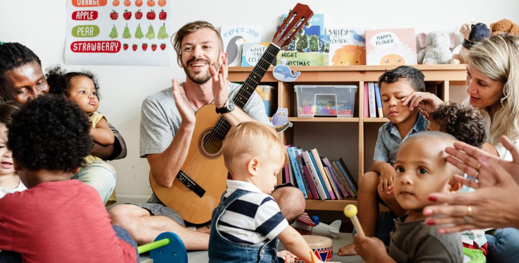 teacher and students playing music